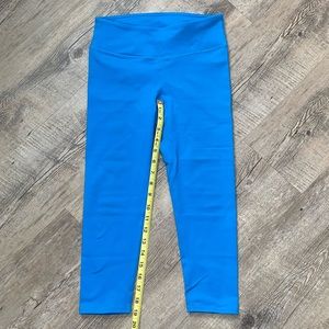 Fabletics Define PowerHold® Mid-Rise Capri in Tropical Blue, XXS